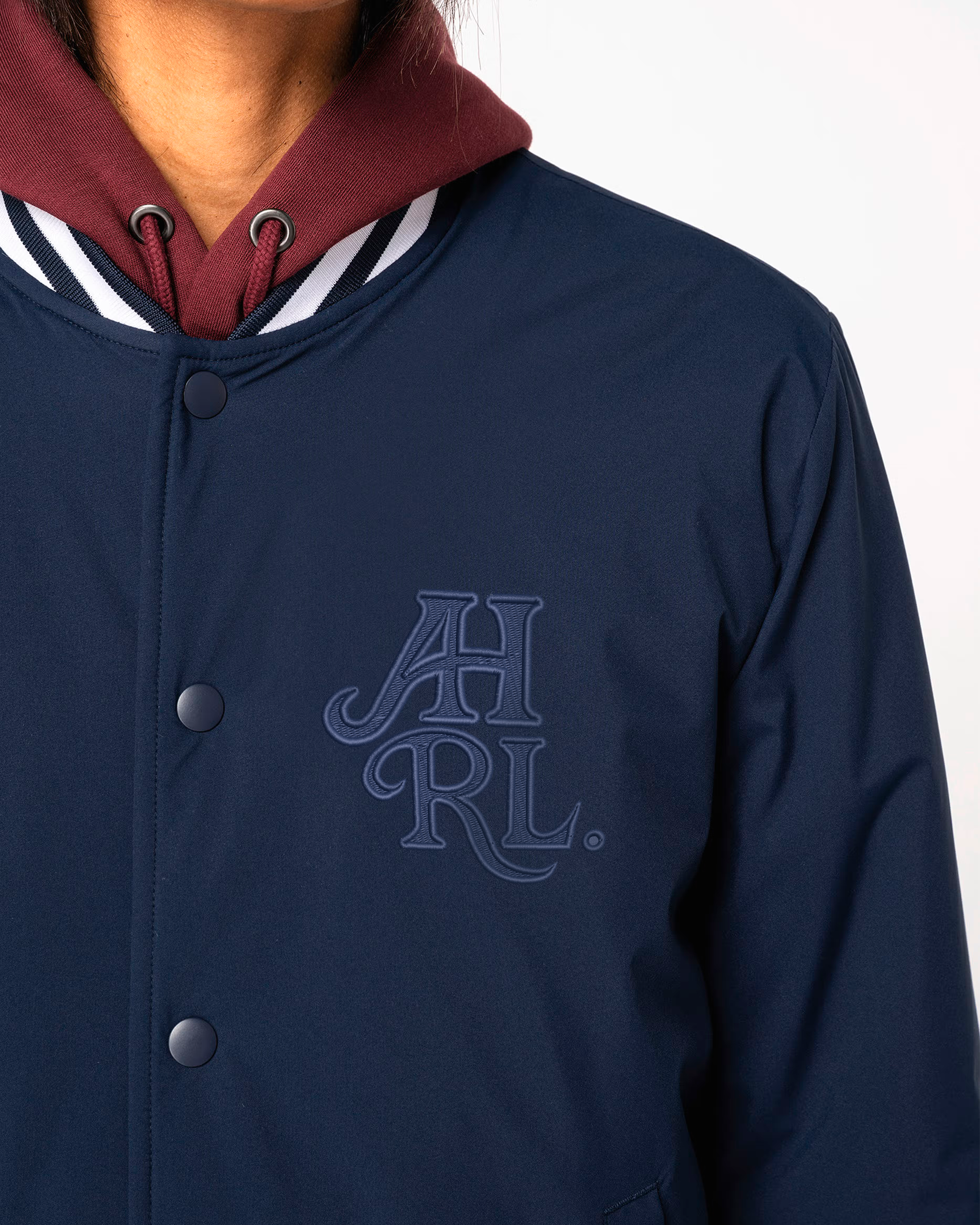 Cazadora Unisex College AHRL. Azul Marino